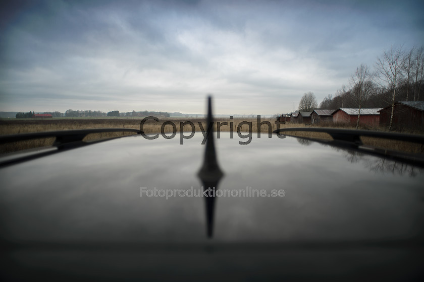 abs-141205-BMW-0029237 
 Open field with huts 
 Keywords: BMW, Swedish country, Car Aerial, Car, Antenna, Car Roof, Roof,